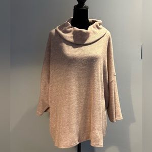 New! Loose fit, dolman sleeve sweater in softest fabric and beige tan color.Boho